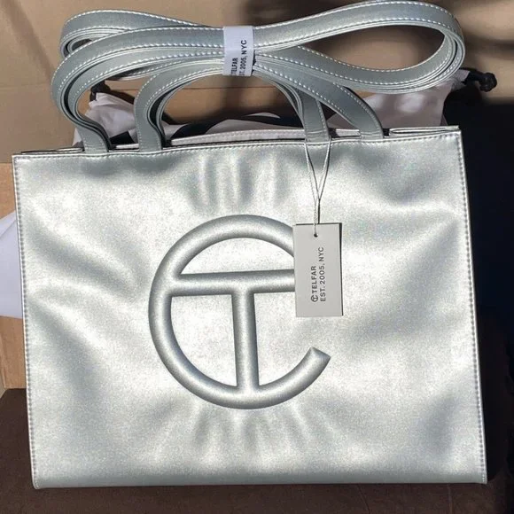 Telfar | Bags | Authentic Silver Medium Telfar Shopping Bag3 Telfar | Bags | Authentic Silver Medium Telfar Shopping Bag3